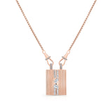 Medium Blade Pear & Emerald (Round & Baguette Pave)